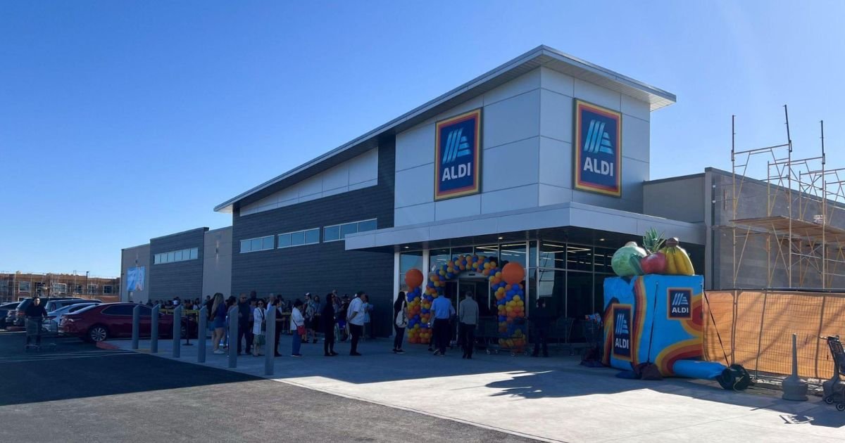 People in line waiting to get into Aldi store.
